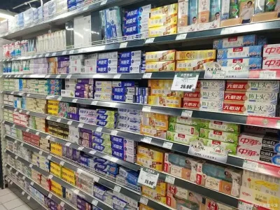 Whitening toothpaste is displayed on retail shelves, highlighting its peroxide whitening formula for everyday consumers.
