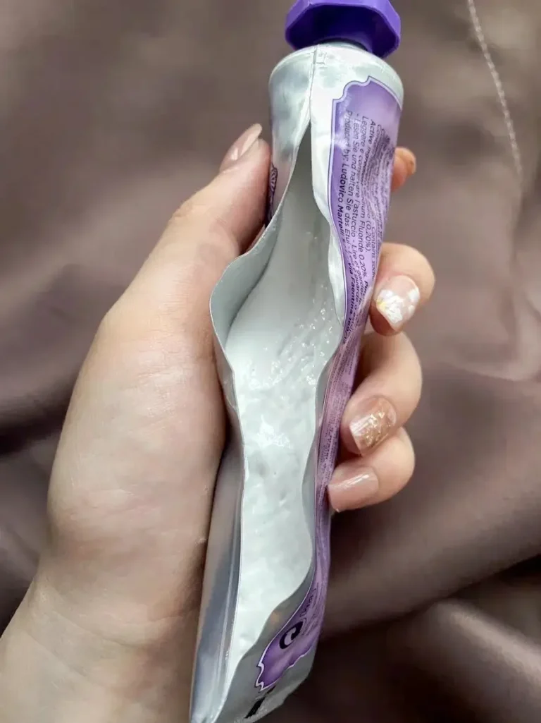 dentist holding white label toothpaste for dental clinics manufacturer samples with custom branding options – ready to order custom branded tubes for clinic sales