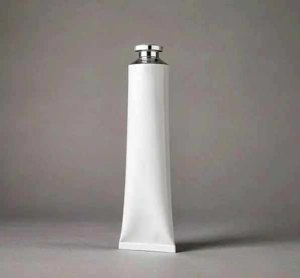 Aluminium barrier laminate toothpaste tube with a crimped tail standing upright